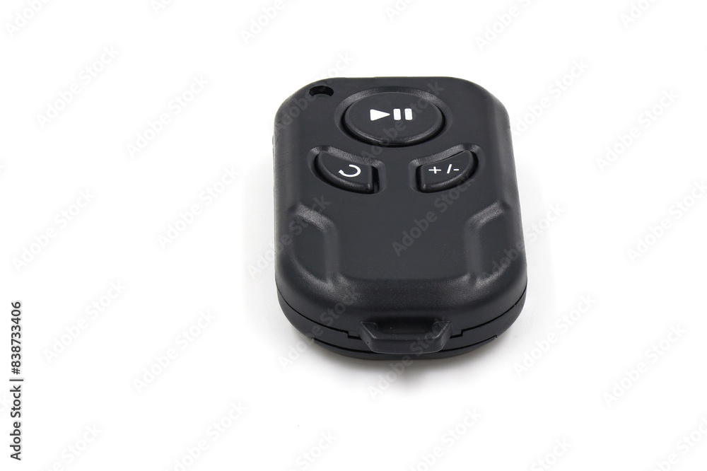 Black remote control on white background. Wireless remote control concept. Black remote control on white background. Wireless remote control concept.
