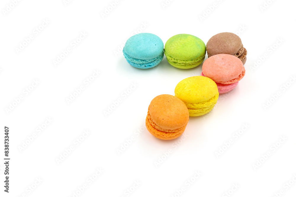 Sweet colorful macarons isolated on white background. Tasty colourful macaroons. Sweet colorful macarons isolated on white background. Tasty colourful macaroons.
