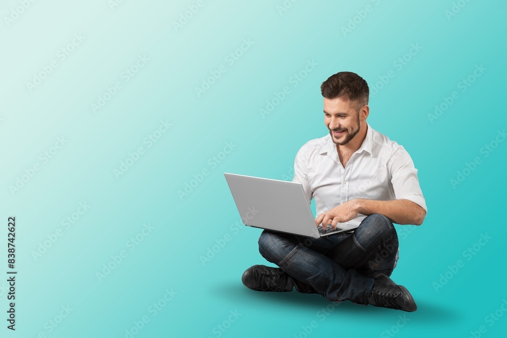 young happy IT man hold laptop pc young happy IT man hold laptop pc