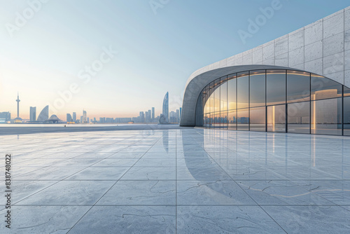 Modern buildings by the lake. The modern urban skyline is in the background.
