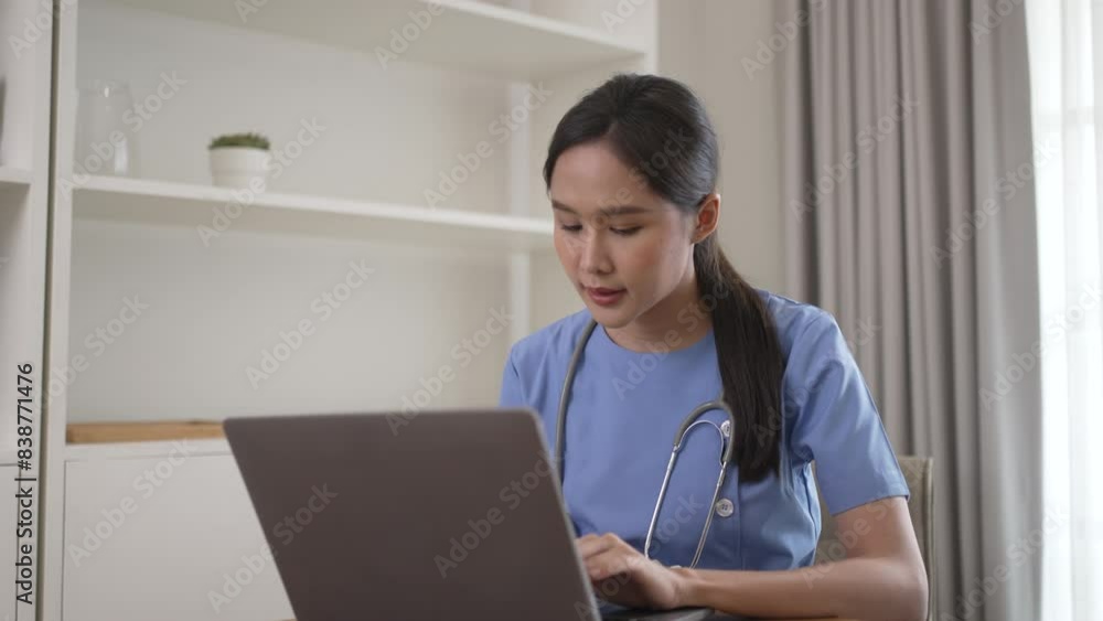 Female health care worker is using digital device. Female health care worker is using digital device.