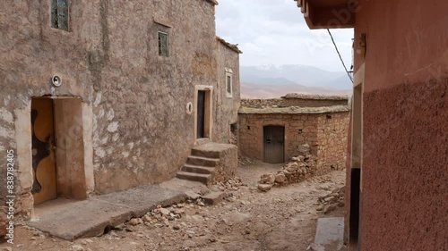 Pan right of apparently abandoned houses in Moulay Brahim Village, Morocco photo