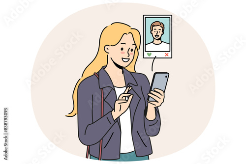 Woman uses dating app on mobile phone, choosing guy likes by photo and browsing profile. Girl with smartphone visits websites for online dating and agrees on date or going to cinema