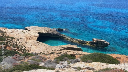 Beautiful turquoise sea water and natural rock formation like pool near Santa Maria Battery, Comino island, Malta. High quality photo photo