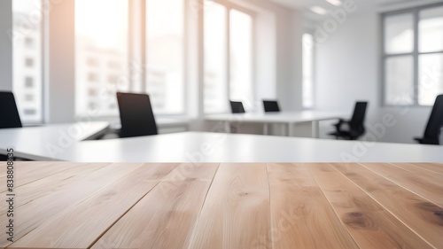 empty wooden desk with blurred business office