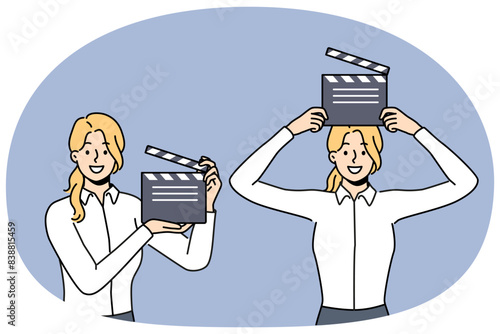 Woman with clapboard for shooting movie works in hollywood film company and dreams of becoming film director. Girl with clapboard to help filming blockbuster demonstrates equipment for recording takes