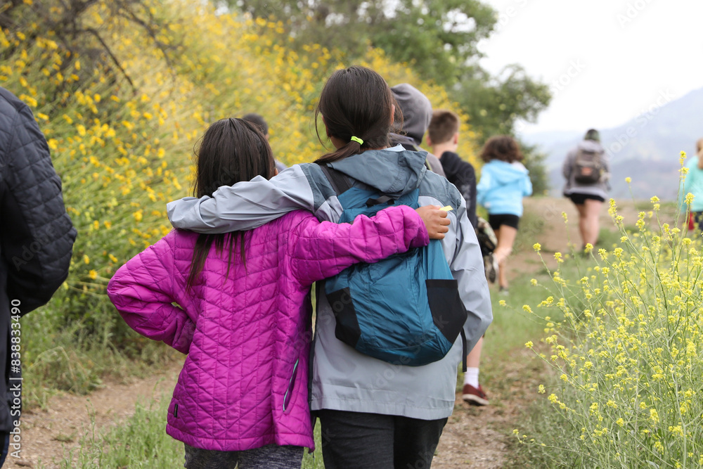 Teens bond among Ojai's wildflowers on hike in Ojai. Teens bond among Ojai's wildflowers on hike in Ojai.