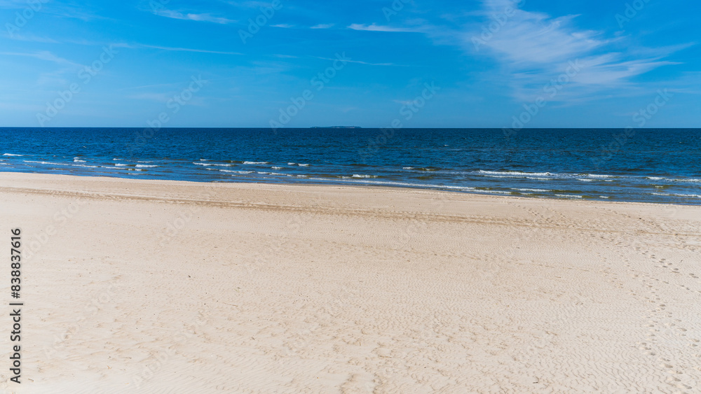 Beautiful seascape. White sand, sea. Baltic Sea. Holidays at sea. Relax