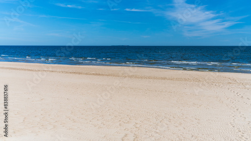 Beautiful seascape. White sand  sea. Baltic Sea. Holidays at sea. Relax