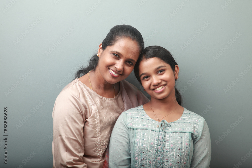 Portrait of an Indian ethnic happy loving mother and daughter Portrait of an Indian ethnic happy loving mother and daughter
