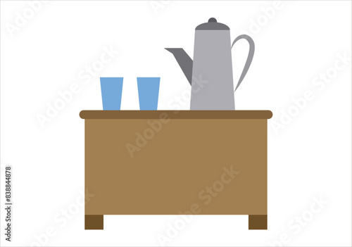 Mesa con cafetera y vasos azules