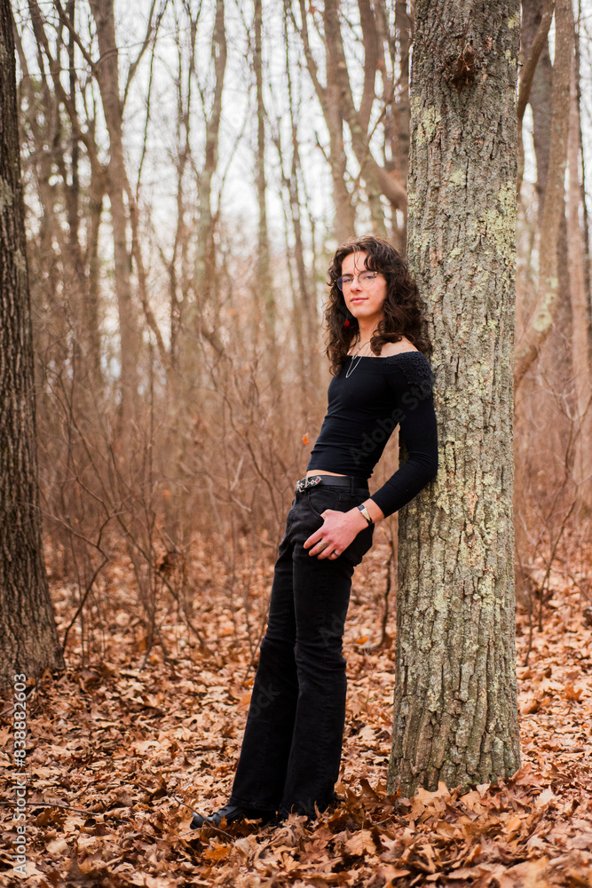 androgynous teen posing in the woods androgynous teen posing in the woods
