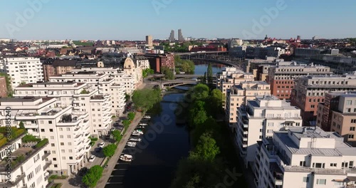 Aerial Pullback Away from Klara Sjo Canal in Stockholm, Sweden. Summer Day photo