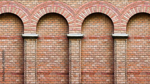 Old brick wall with a pattern of arches