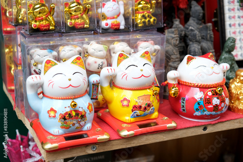 Chinese souvenir cats on Shanghai market photo