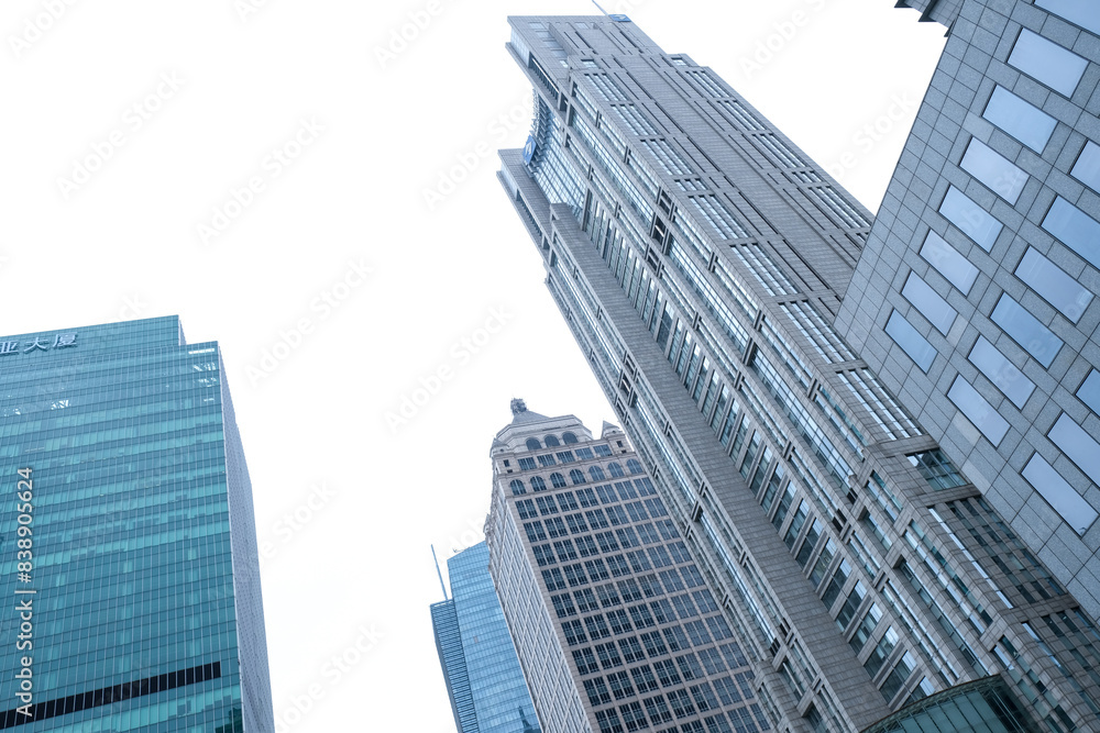 Low angle of view to Skyscrapers Shanghai city, China. Glass business centers Low angle of view to Skyscrapers Shanghai city, China. Glass business centers