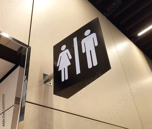 Male and female toilets sign in a shopping mall.