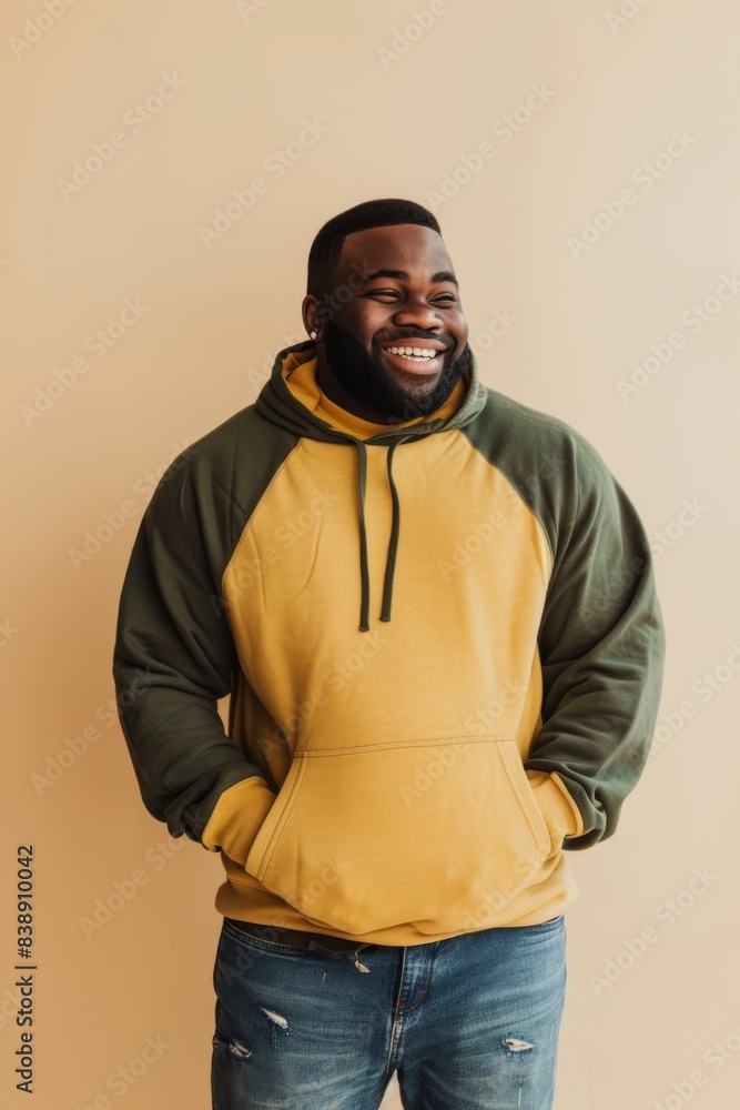 Studio Portrait of a handsome black man confidently posing for the camera. Studio Portrait of a handsome black man confidently posing for the camera.