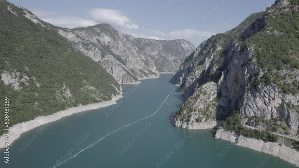 Deep canyon in Piva Lake (Pivsko Jezero), Pluzine, Montenegro Deep canyon in Piva Lake (Pivsko Jezero), Pluzine, Montenegro