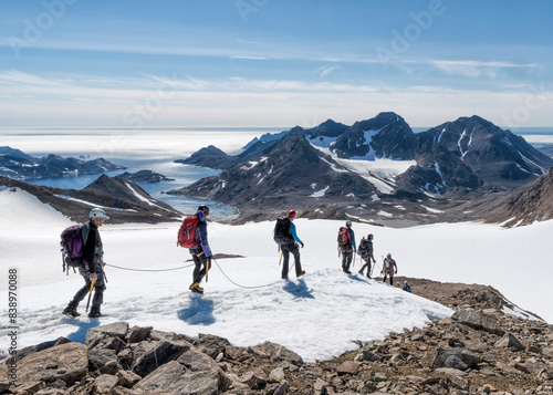 Obraz na płótnie Greenland, Sermersooq, Kulusuk, Schweizerland Alps, group of people walking in snow w salonie