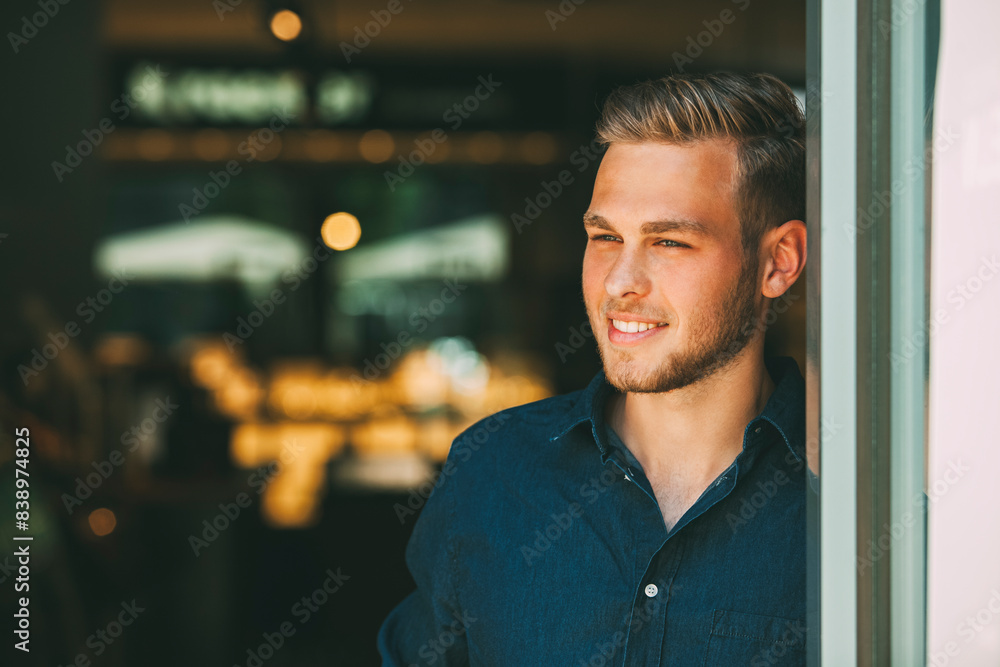 Portrait of smiling young man looking at distance Portrait of smiling young man looking at distance