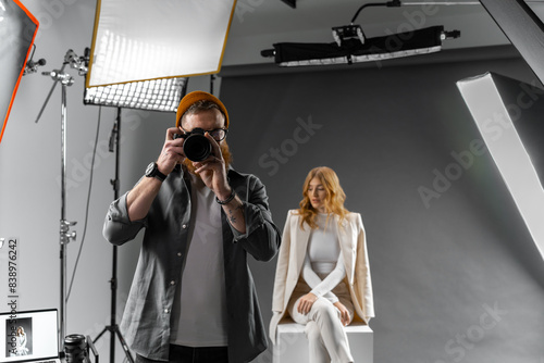 Photographer and fashion model in studio for creative art, clothes brand and designer social media blog