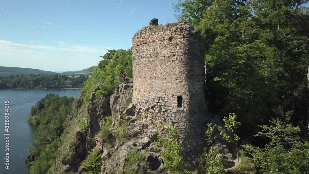 Aerial view of castle ruins Oheb. Romantic medieval ruins over lake Sec. Czech republic, European union. Aerial view of castle ruins Oheb. Romantic medieval ruins over lake Sec. Czech republic, European union.