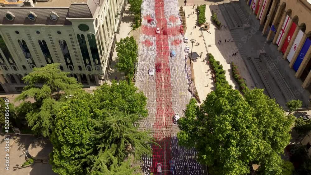26 May 2024 Independence Day in Georgia, Tbilisi, on Rustaveli Aveniu and Ribbons in the colors of the flag in front of the Parliament 26 May 2024 Independence Day in Georgia, Tbilisi, on Rustaveli Aveniu and Ribbons in the colors of the flag in front of the Parliament