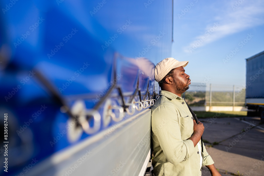 Tired truck driver having problems at work. Tired truck driver having problems at work.