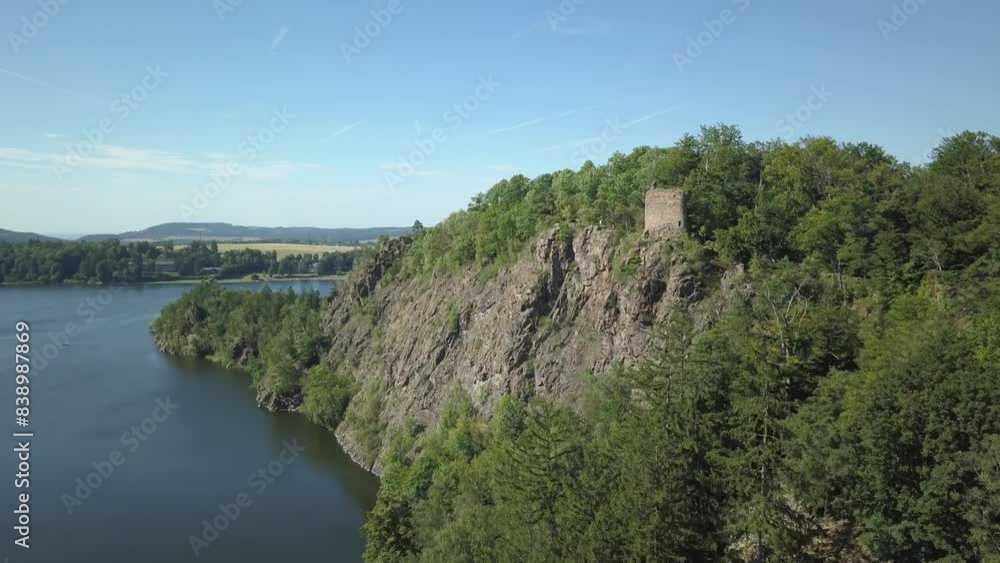 Aerial view of castle ruins Oheb. Romantic medieval ruins over lake Sec. Czech republic, European union. Aerial view of castle ruins Oheb. Romantic medieval ruins over lake Sec. Czech republic, European union.