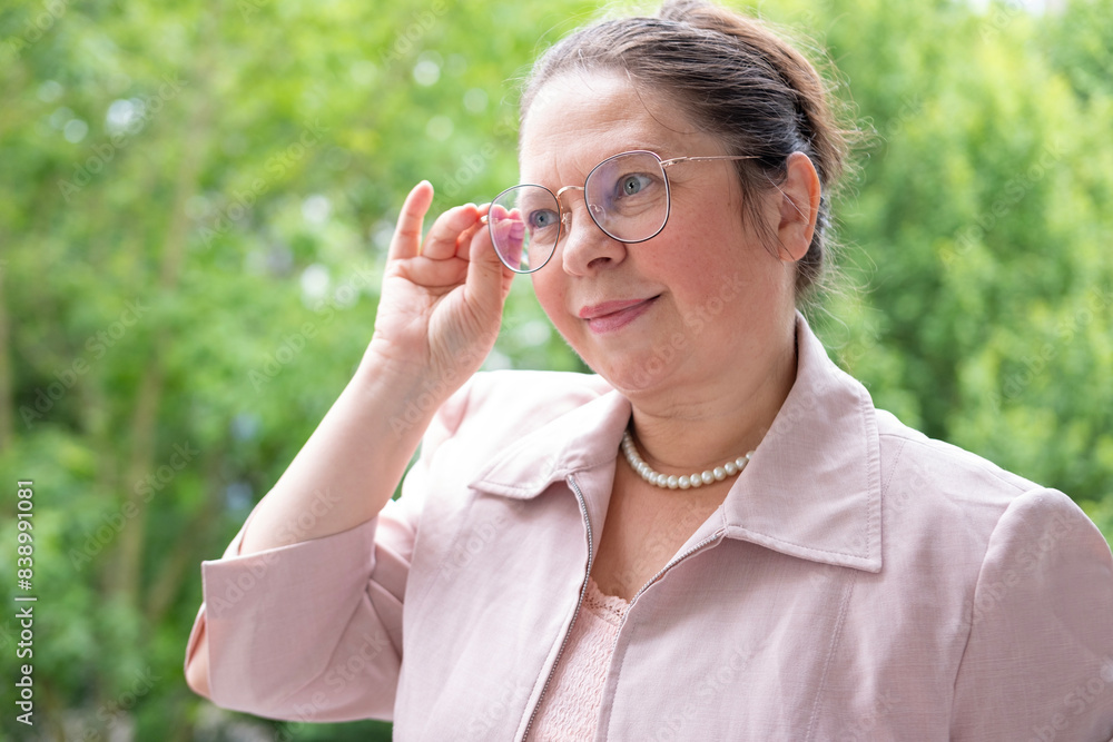mature businesswoman in glasses, elegant independent woman 50 years old in pink blazer, age-related changes, balance between professional goals and personal well-being mature businesswoman in glasses, elegant independent woman 50 years old in pink blazer, age-related changes, balance between professional goals and personal well-being