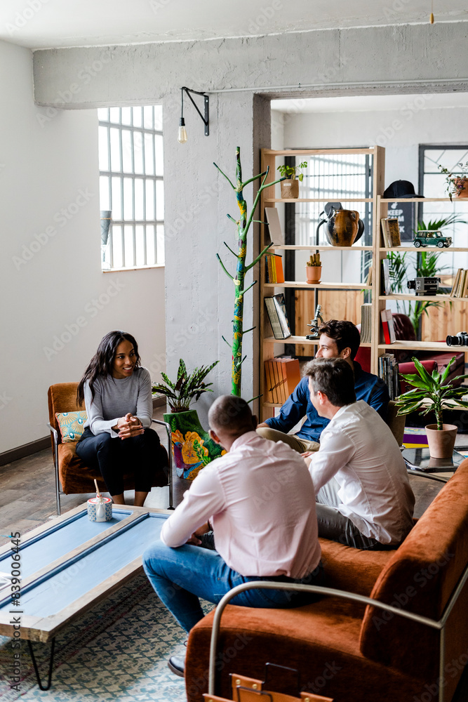 Business team having a discussion in loft office