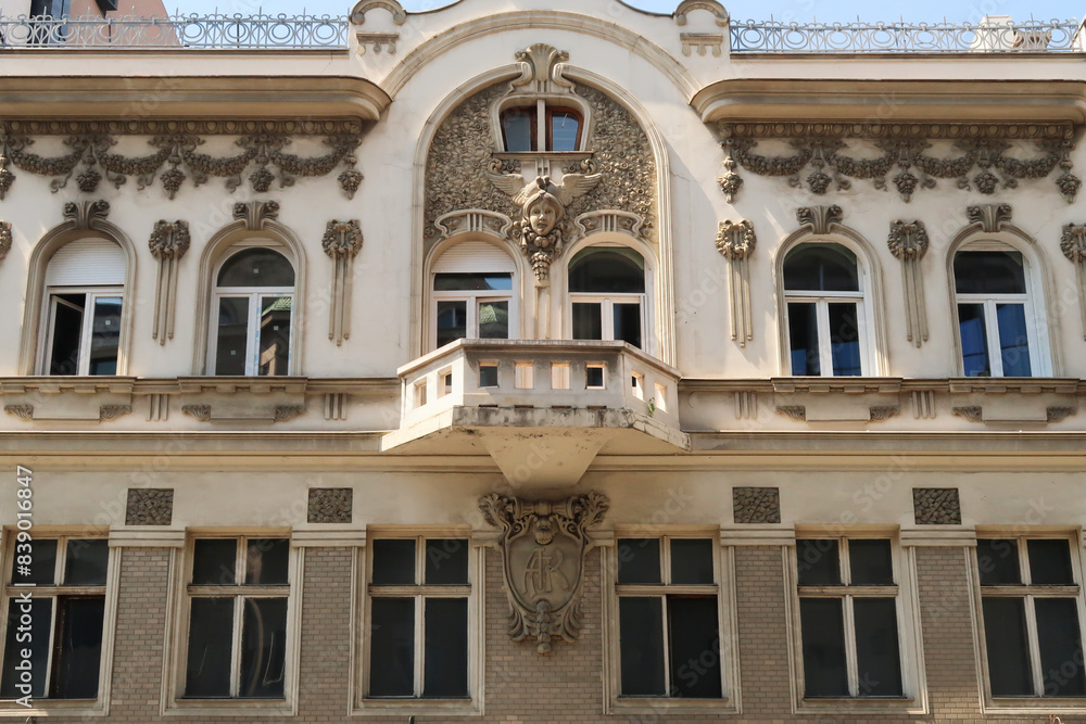 The elaborate facade of the Aron Levi Trading House decorated with many ornaments and reliefs, an example of Art Nouveau architecture in the city center of Belgrade, Serbia