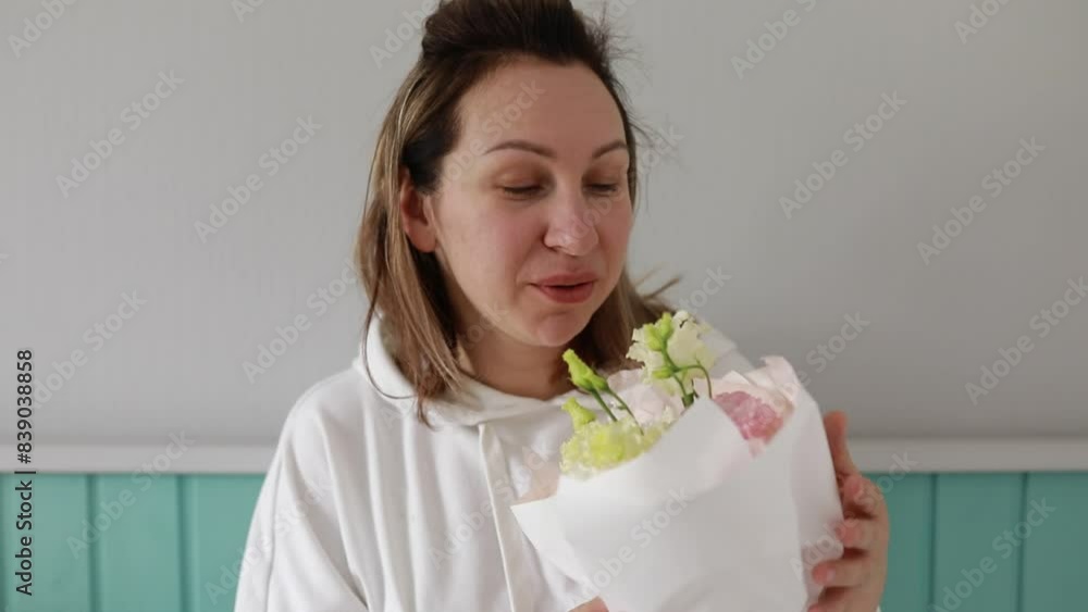 Woman Enjoys Aromatic Flower Bouquet at Cozy Cafe During Brunch Hours Woman Enjoys Aromatic Flower Bouquet at Cozy Cafe During Brunch Hours