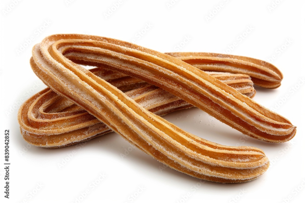 Freshly fried churros with a golden crispy texture on a white background Freshly fried churros with a golden crispy texture on a white background