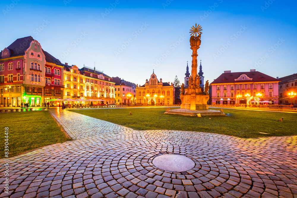 Timisoara, Banat. Baroque beautiful Union Square, travel in Romania, twilight image.