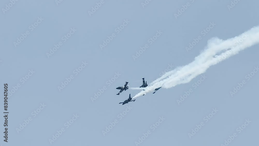 Four fighter jets during Fort Lauderdale Air show, jets touch wings Four fighter jets during Fort Lauderdale Air show, jets touch wings