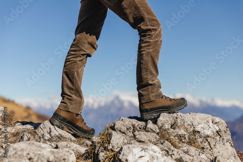 Italy, Como, detail of hiking boots on the rock © tunedin