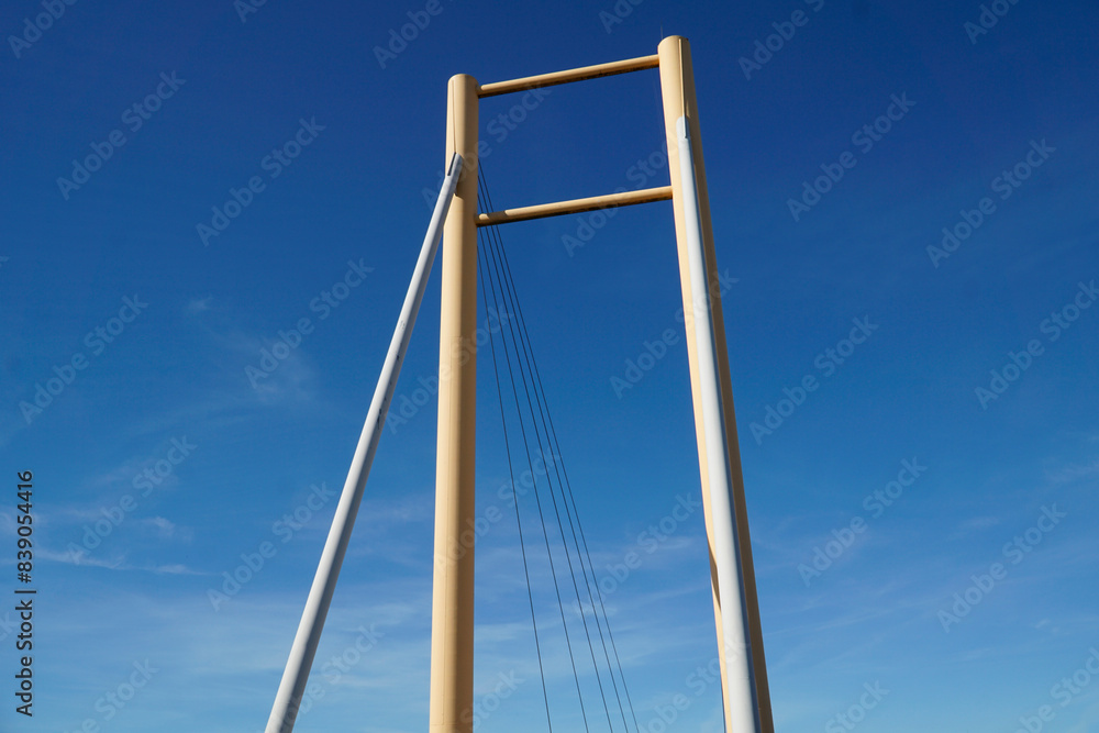 Cable-stayed bridge and cloudless sky - view from below Cable-stayed bridge and cloudless sky - view from below