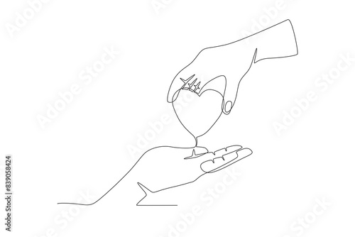 Hands that donate hearts. Organ donation day concept one-line drawing