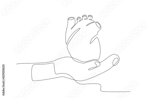 Hands and heart. Organ donation day concept one-line drawing