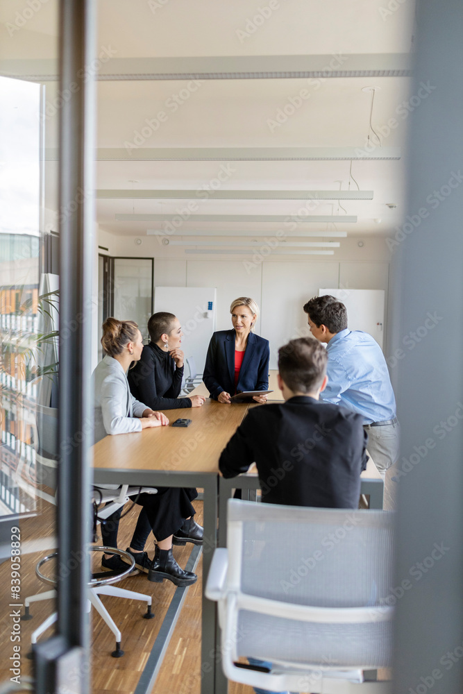 Businesswoman leading a meeting in office