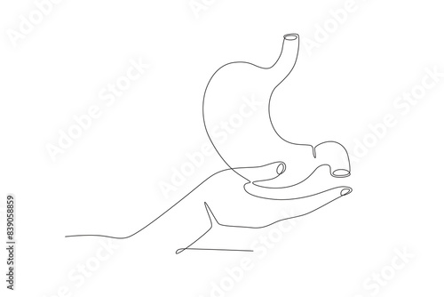 The hand holding the stomach. Organ donation day concept one-line drawing