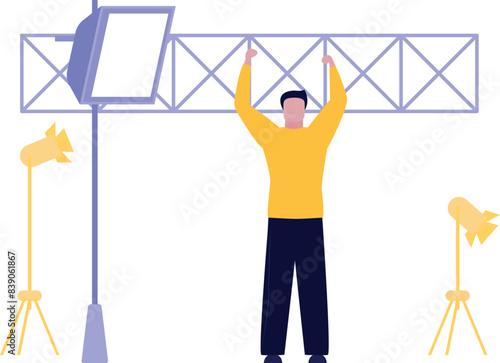 Boy stands near softbox lightning.