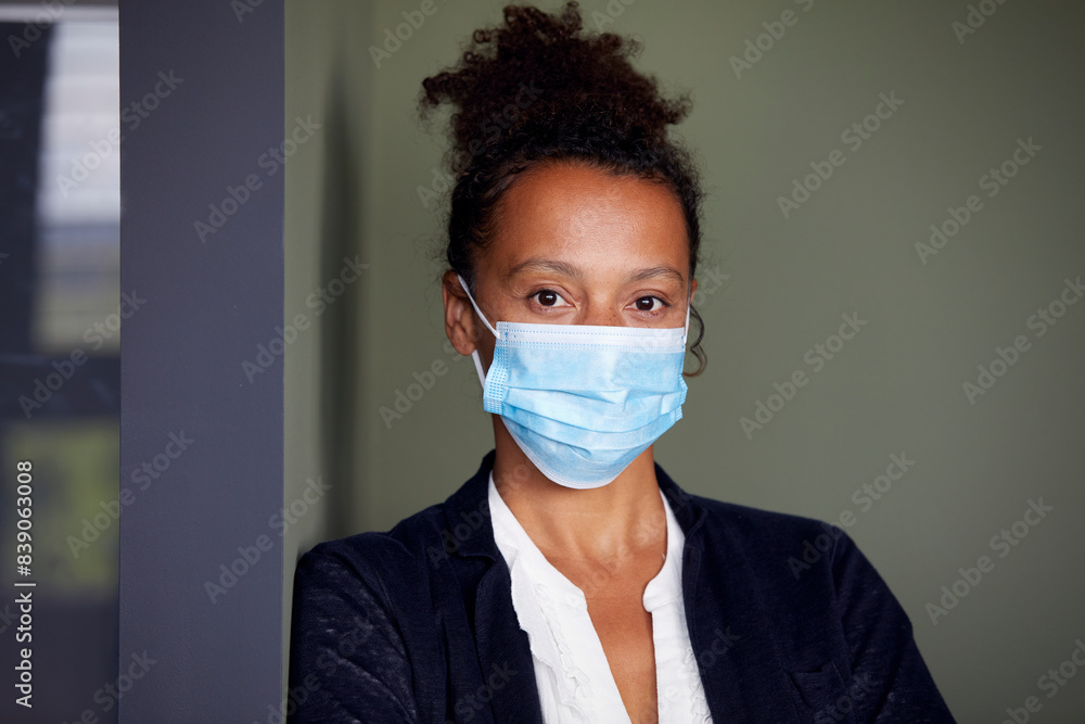 Portrait of businesswoman wearing light blue protective mask Portrait of businesswoman wearing light blue protective mask