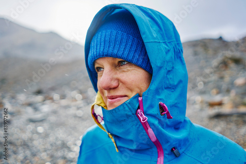 Argentina, Patagonia, El Chalten, portrait of woman in raincoat at Cerro Torre in Los Glaciares National park photo