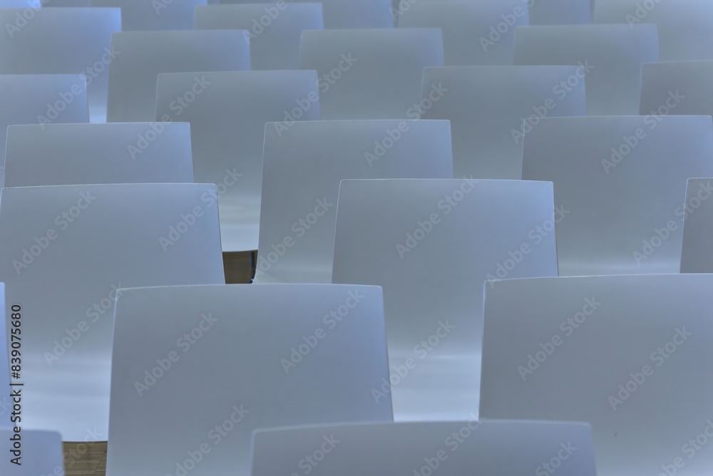 Fototapeta premium White seating in a school assembly room.