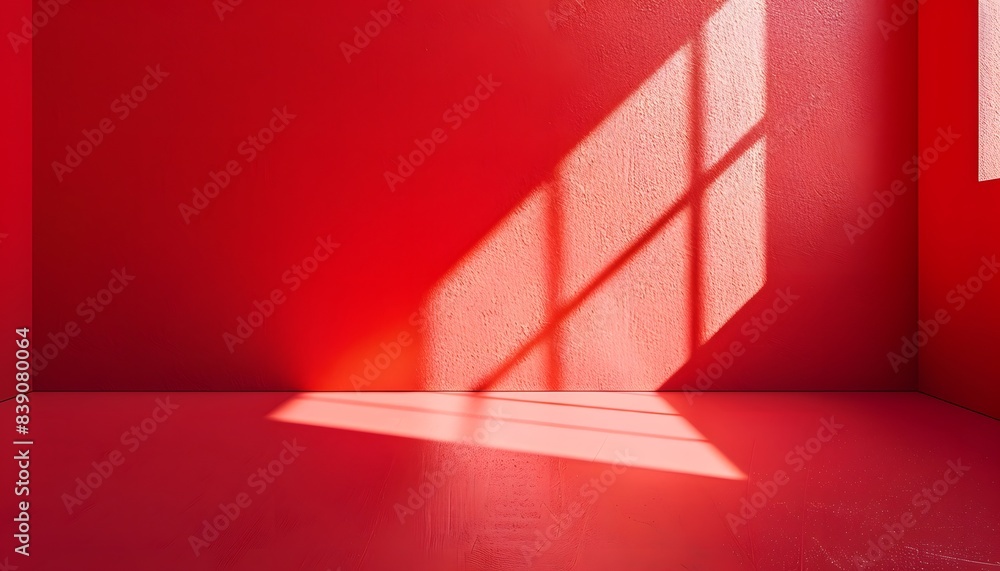 Obraz premium An empty red room with window shadows in a minimalist style background for product advertisement 