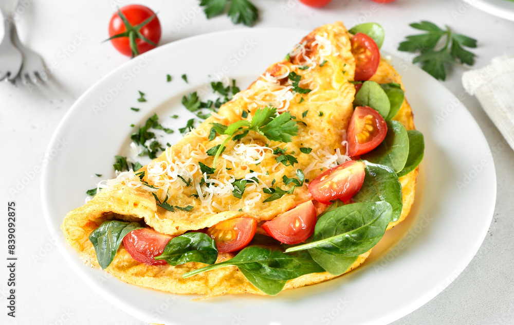 Stuffed omelette with tomatoes and spinach Stuffed omelette with tomatoes and spinach