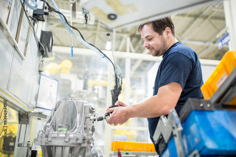 Man working in a modern factory Man working in a modern factory